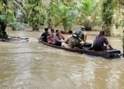 OMP-LK24, Melawan Arus Yang Deras TNI – POLRI Kawal Logistik Pilkada Di Wilayah Banjir Kecamatan Kunto Darussalam