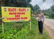 Pemasangan Baliho Himbauan Keselamatan di Wilayah Inuman oleh Sat Lantas Polres Kuansing
