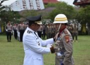 Kasat Reskrim Polres Kampar, AKP Gian Wiatma Joni Mandala, Dipercaya Sebagai Komandan Upacara HUT RI Ke-80.